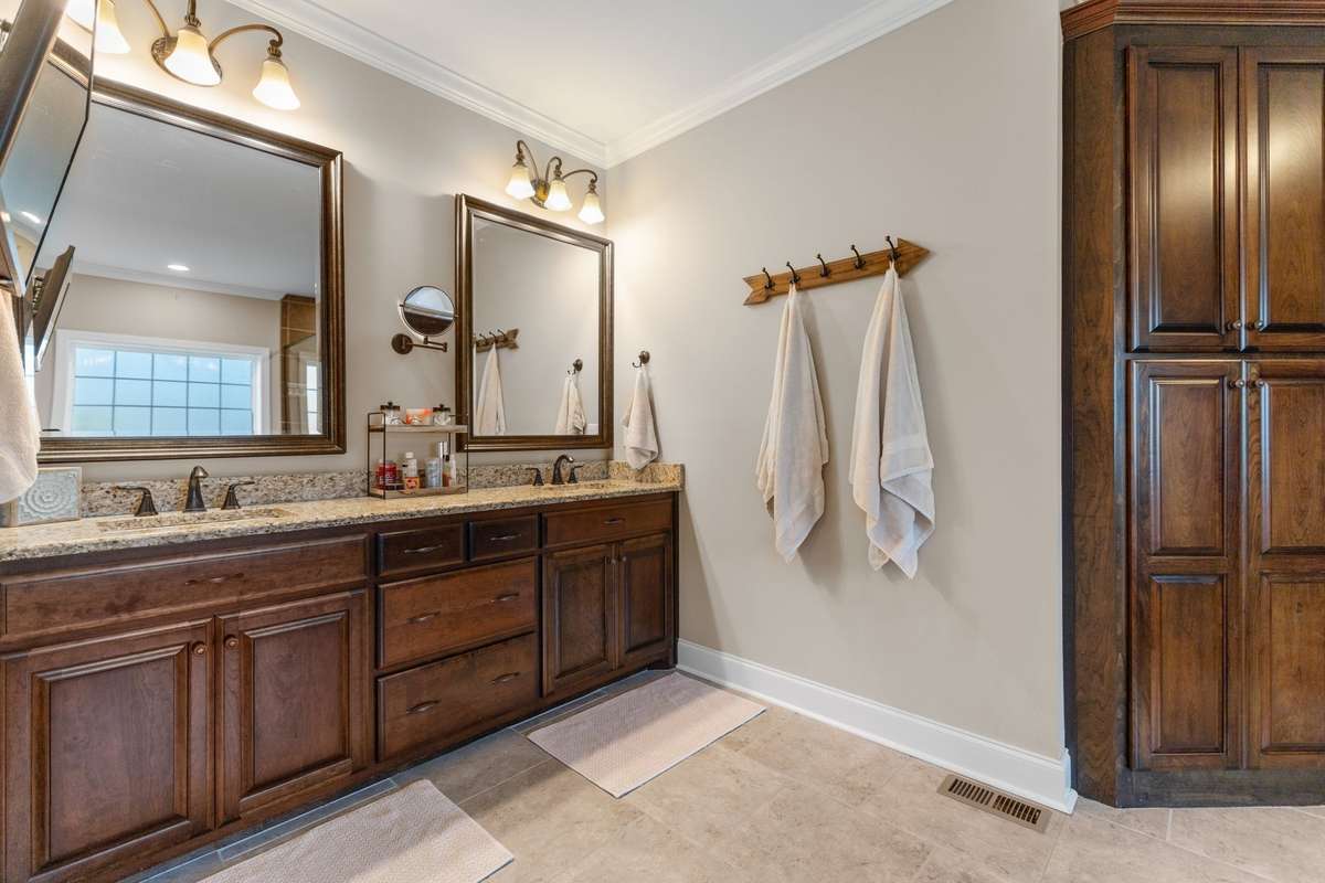 Double vanities. Granite counters, High end cabinetry and finishes.