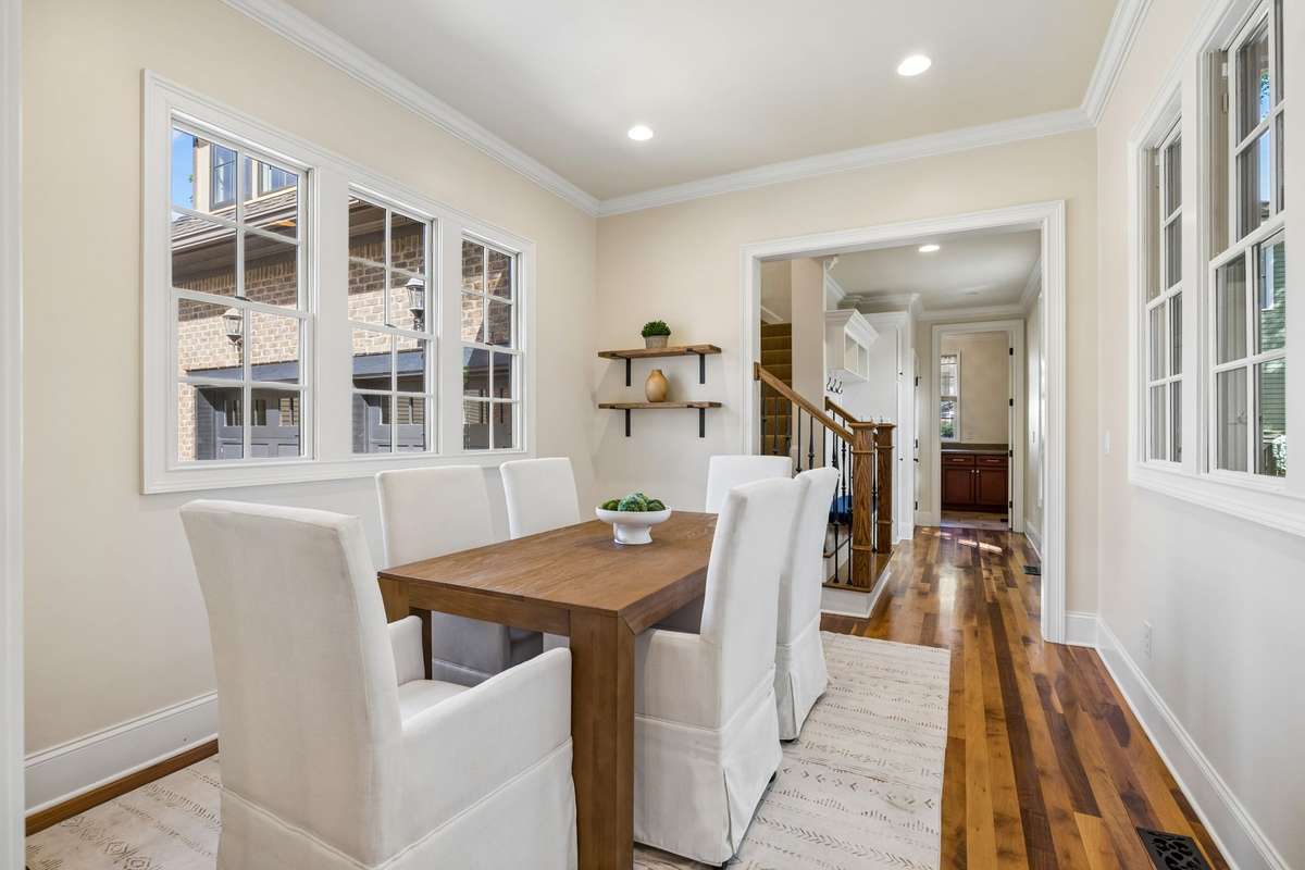 An additional dining area just beyond provides even more room for hosting and gathering.