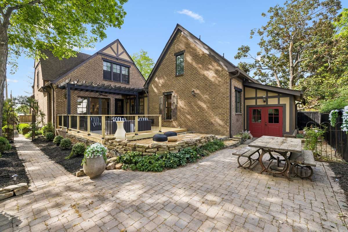 Fresh landscaping enhances the beauty and serenity of the space.