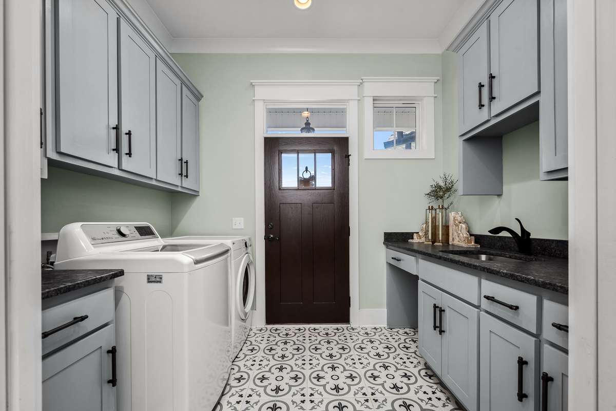 Even this beautiful laundry room leading to outside is full of details!
