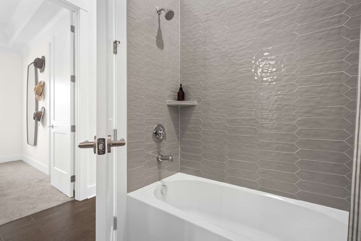 Photos shown are of a model home and are for illustrative purposes only. The actual home will vary in finishes, materials, colors, options, and upgrades. Buyers should verify all features and selections prior to purchase.