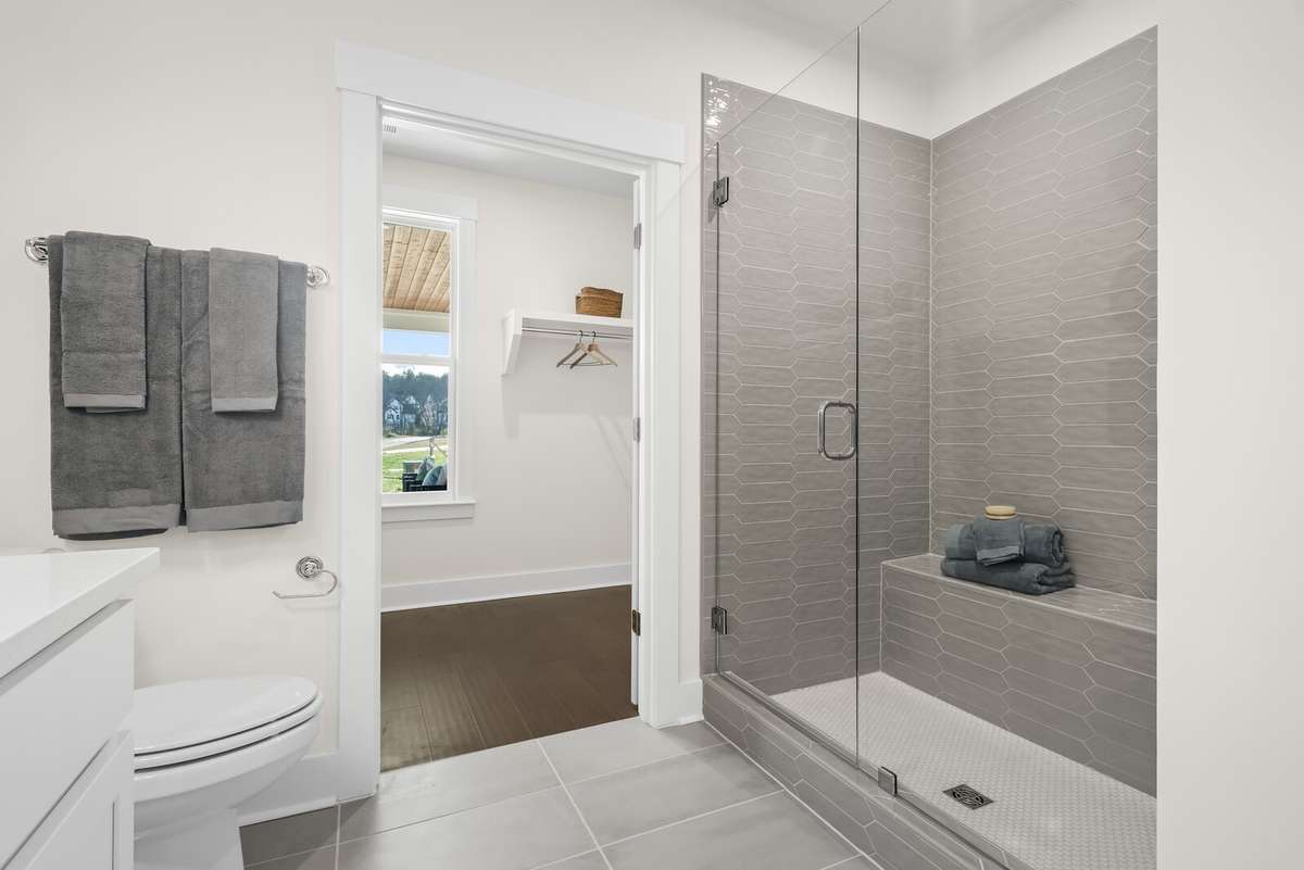 Photos shown are of a model home and are for illustrative purposes only. The actual home will vary in finishes, materials, colors, options, and upgrades. Buyers should verify all features and selections prior to purchase.