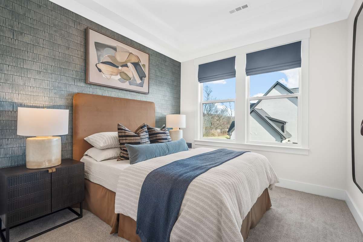 Photos shown are of a model home and are for illustrative purposes only. The actual home will vary in finishes, materials, colors, options, and upgrades. Buyers should verify all features and selections prior to purchase.
