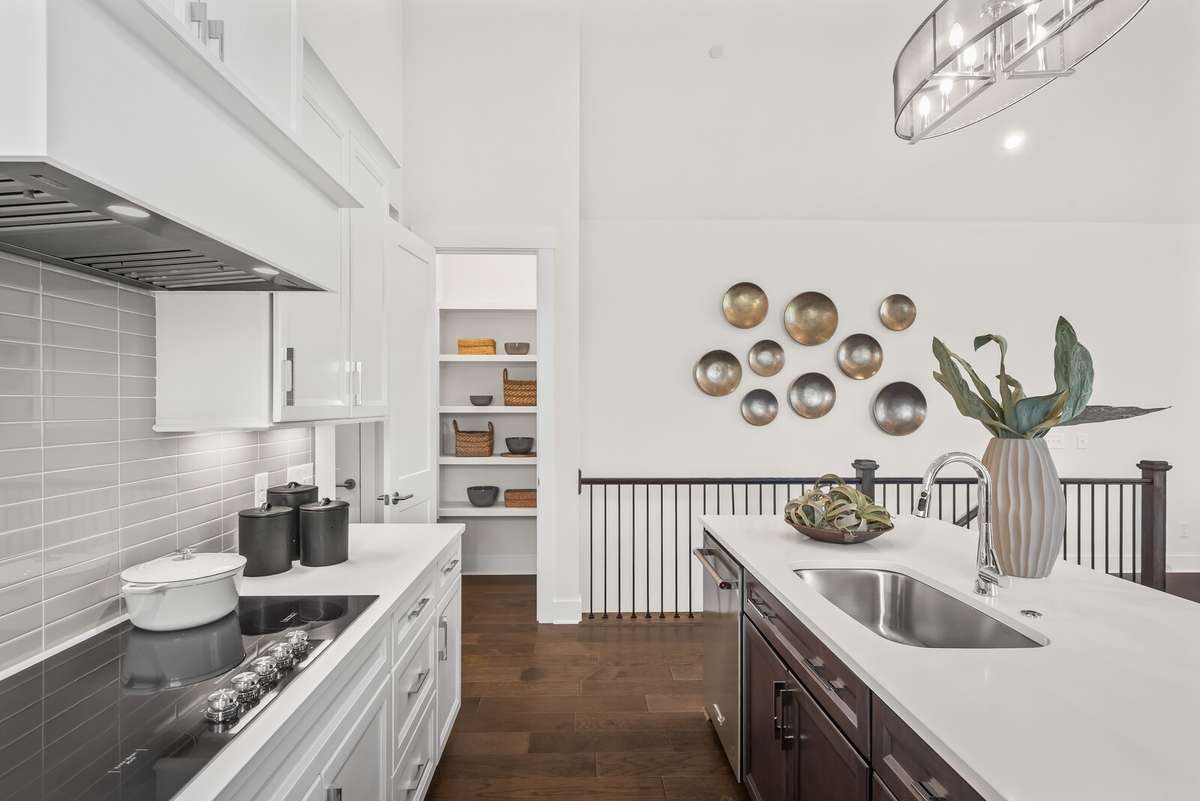Photos shown are of a model home and are for illustrative purposes only. The actual home will vary in finishes, materials, colors, options, and upgrades. Buyers should verify all features and selections prior to purchase.
