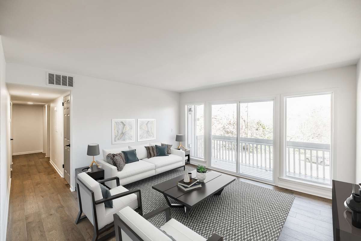 Virtually staged living room
The Living Room allows you to view the parking lot, but also the stunning TN landscape