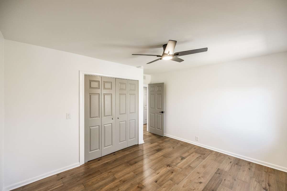 Both Bedrooms have hardwood flooring, ceiling fans and large closets