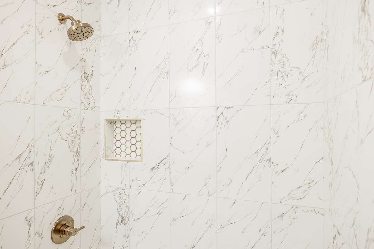 Shower/Tub Combo with Gold Accents