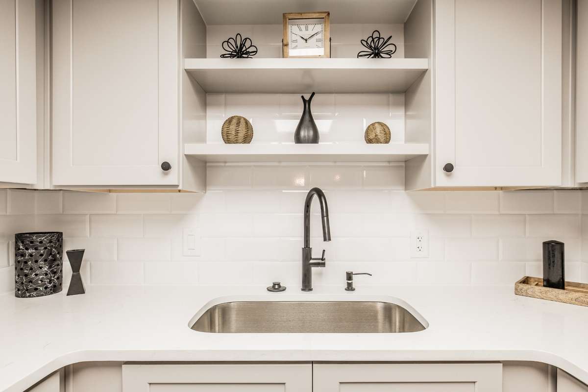 Total Renovation! New Appliances, Cabinets, Flooring, Countertops and Lighting!