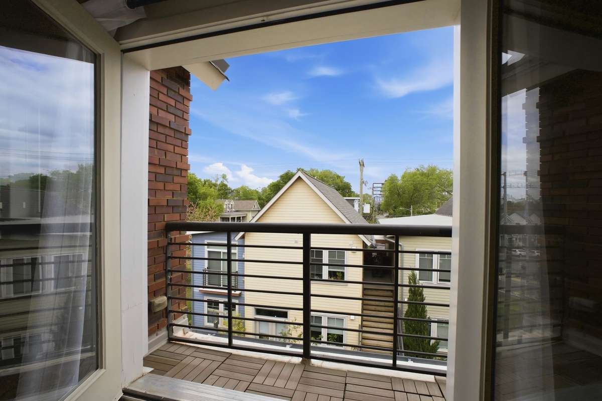 Balcony overlooking common area and activity space.