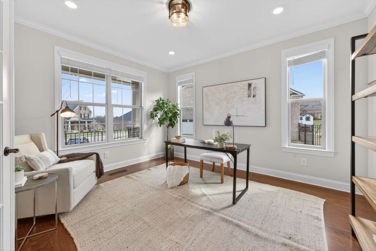 Private office located just off the entry, filled with natural light—creating an inspiring and functional workspace.