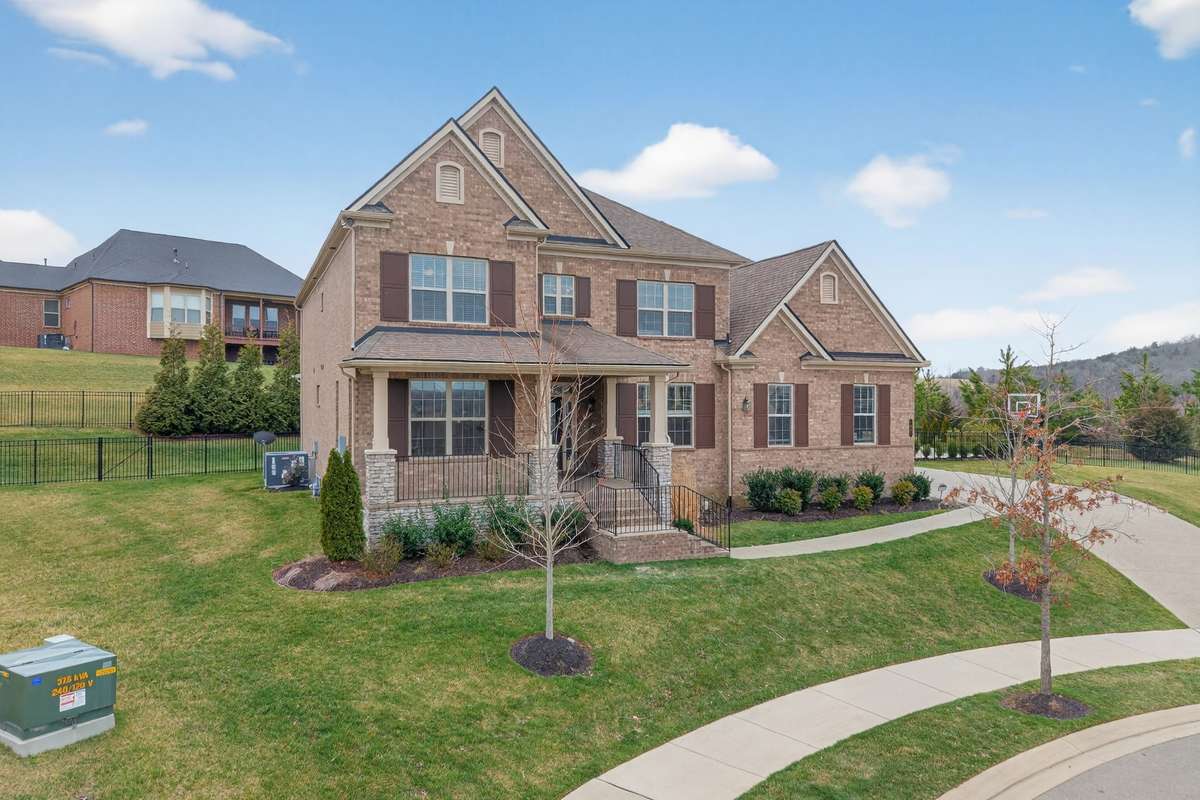 Grand curb appeal on a quiet cul-de-sac in The Crest at Ladd Park—where privacy meets prime convenience of Franklin.