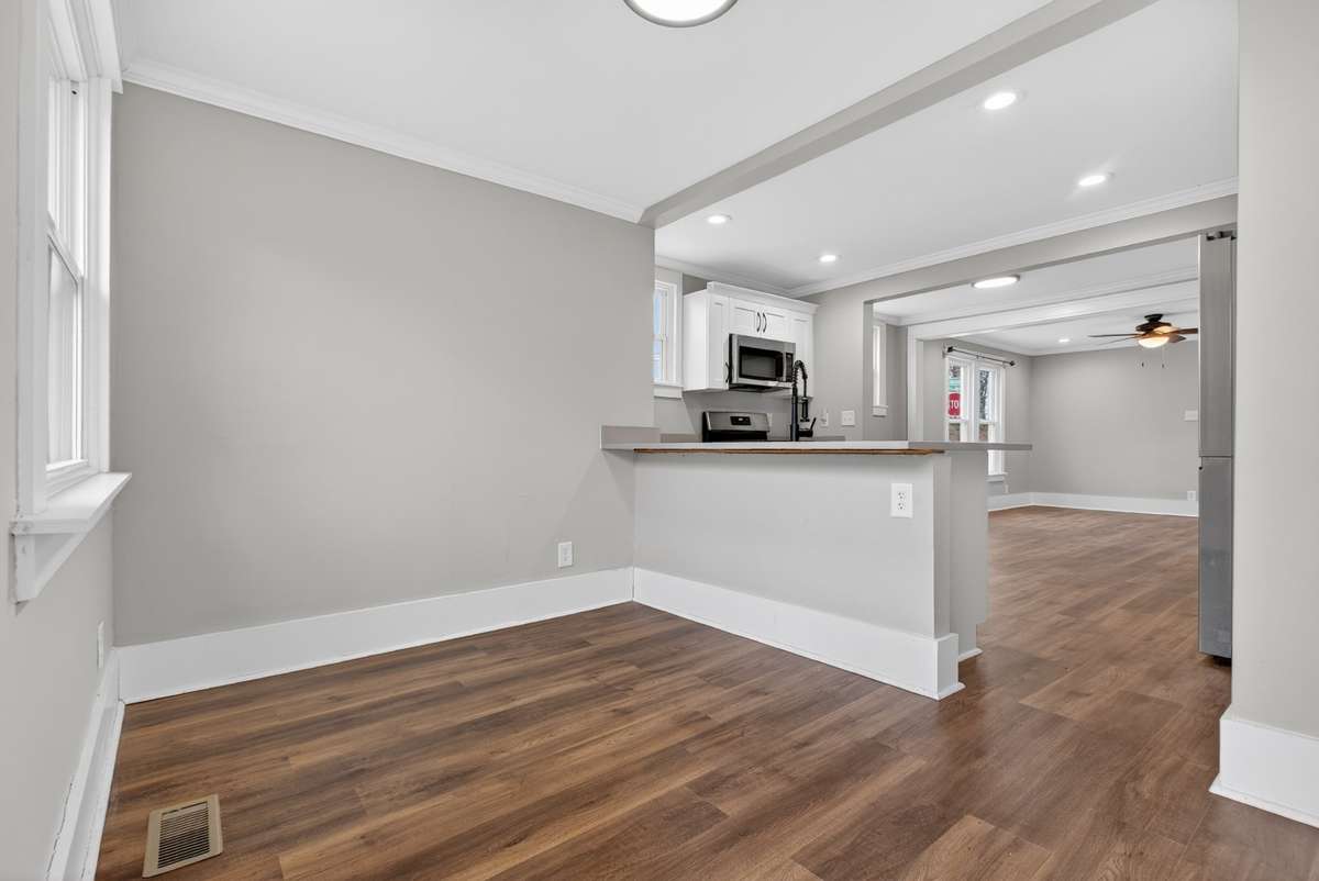 Another view of the area for your kitchen table, or could even be turned into another seating area or office area