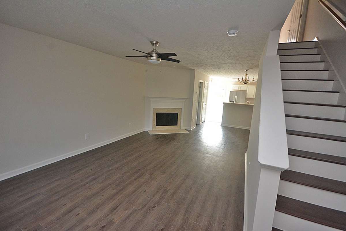 Very spacious living area with wood burning fireplace