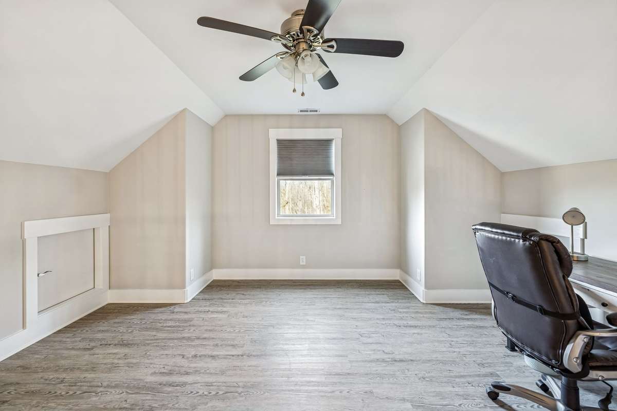 The loft makes a great home office or bunk room for guests!