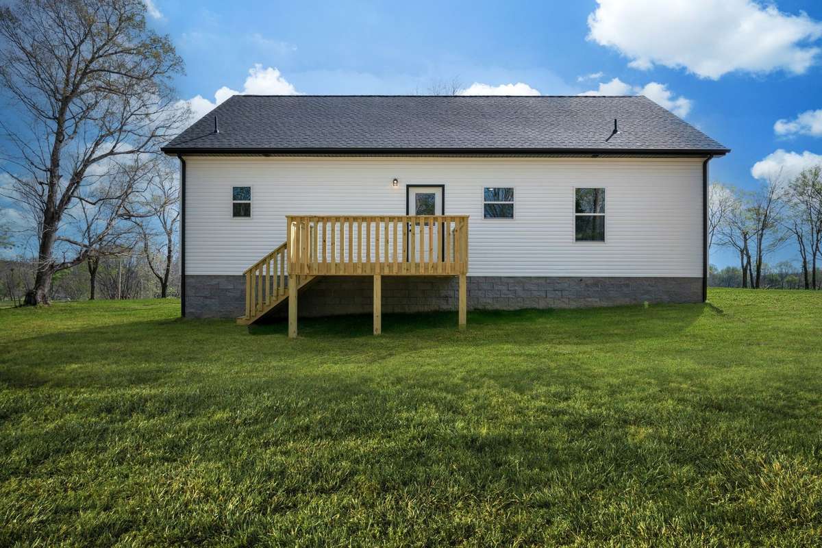 Deck Off Kitchen Perfect for Watching Sunsets
NOTE: Green Grass Edits on all Exterior Photos