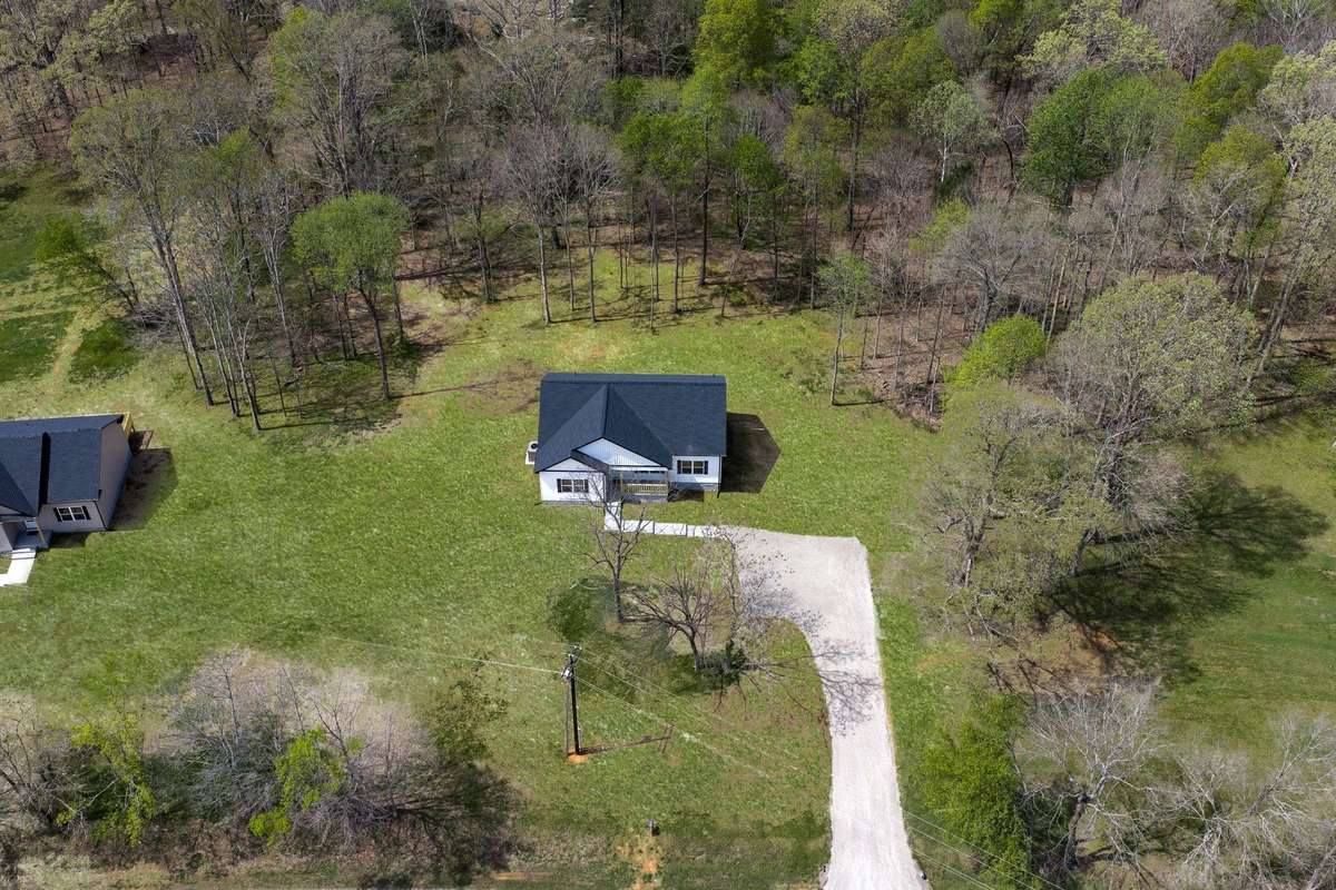 Drone View of This Property  NOTE: Green Grass Edits on all Exterior Photos