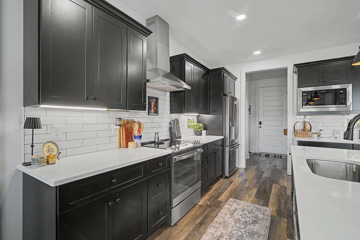 Straight ahead to the right is an amazing walk in pantry.