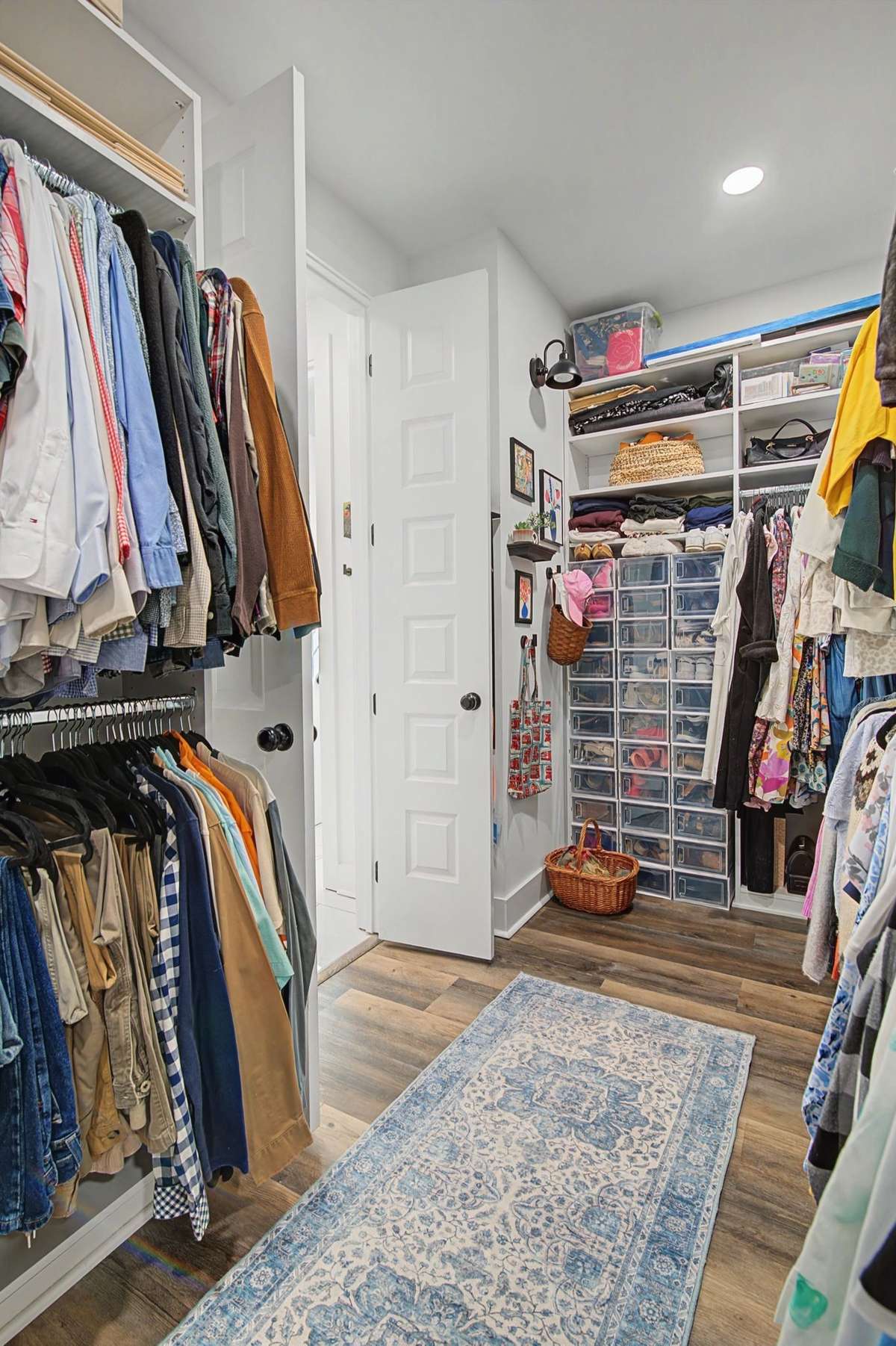 Large walk-in closet with custom shelving.
