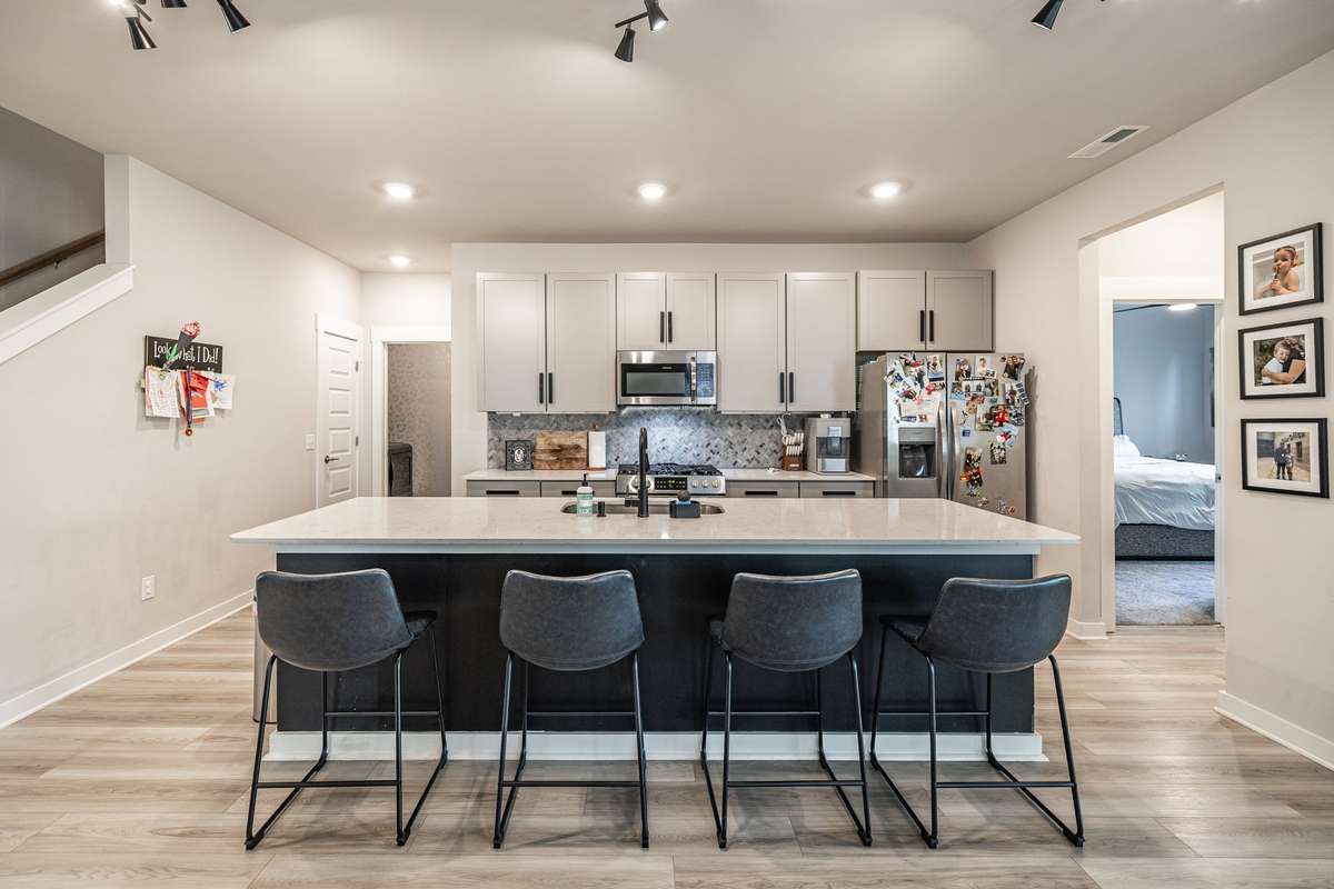 The large kitchen flows easily into the dining area and family room
