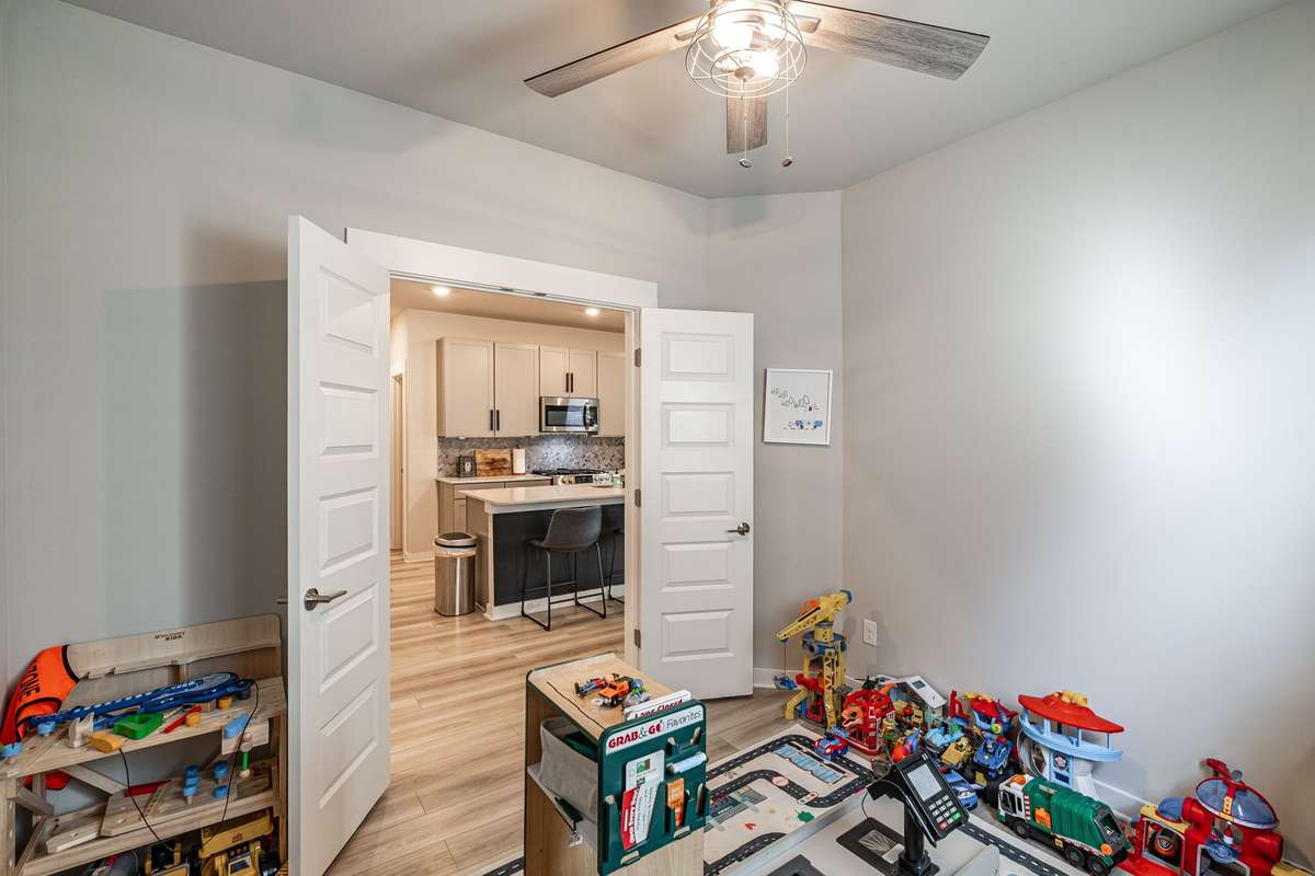 Playroom, Office, Craft room.....however you use this FLEX-ROOM, it is valuable space!   Right off the kitchen, you won't miss a thing but the French doors allow the privacy you need sometimes