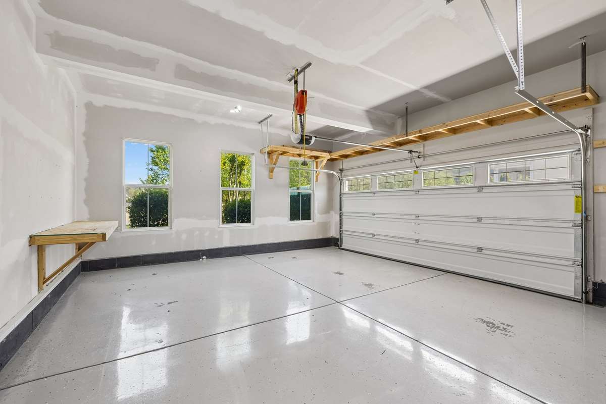 Lots of storage has been added in the garage, and the floors have been epoxy-painted.