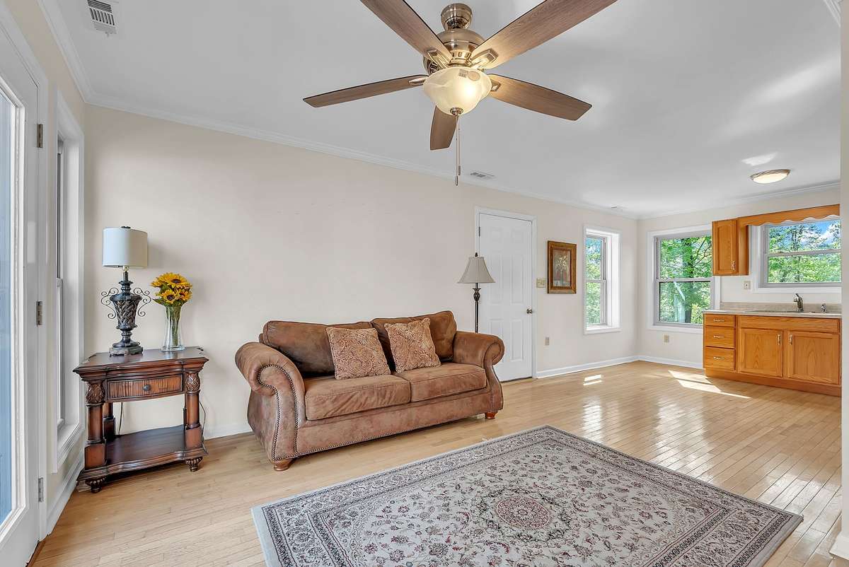 Mother-in-law quarters: fully attached yet private, with its own kitchen, bath, living area, bedroom, and closet. Perfect for family, guests, or rental income