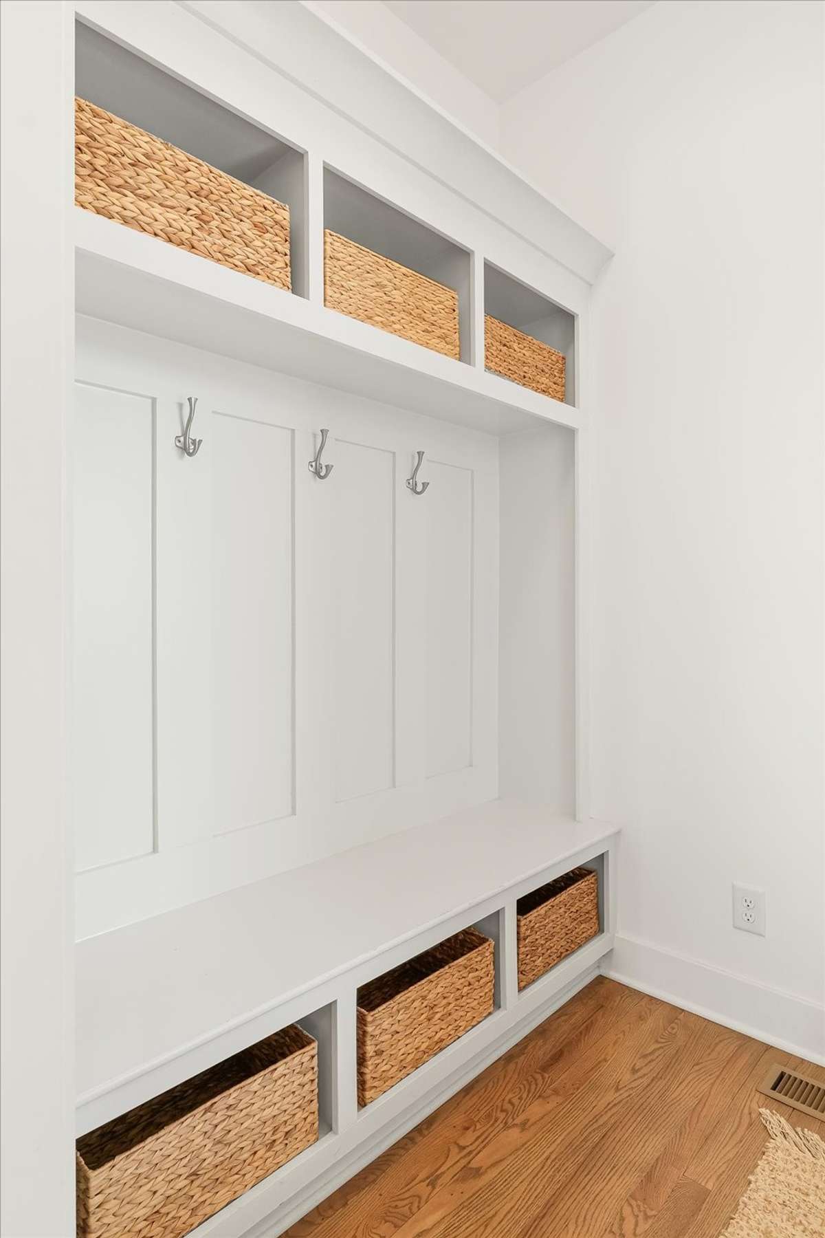 Cubby area for coats and bags