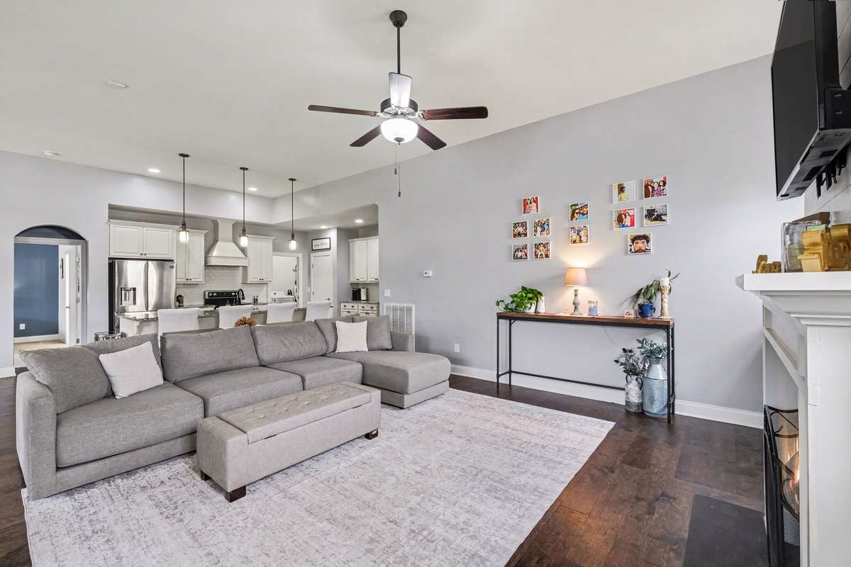 Living room is open to the kitchen with the perfect amount of separation.