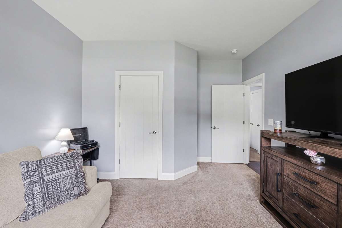 Bedroom 2 on main floor. 12x12. Large closet