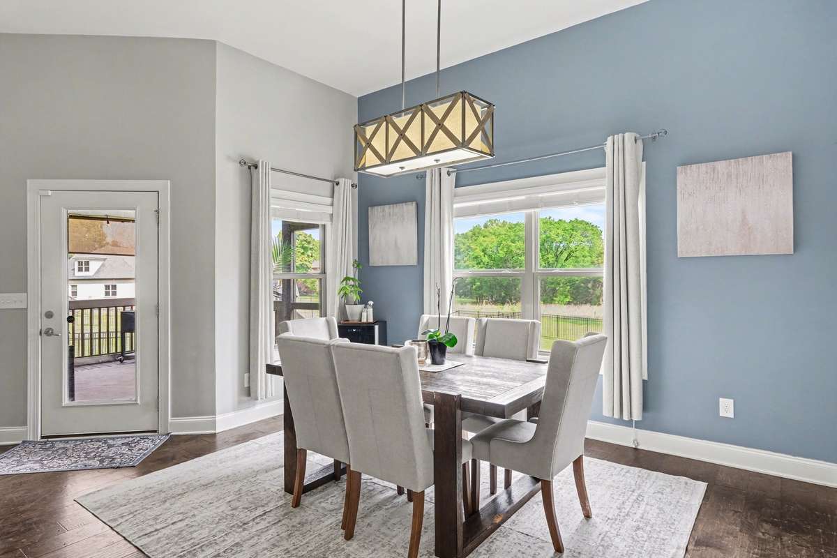 Large dining room with lots of natural light.