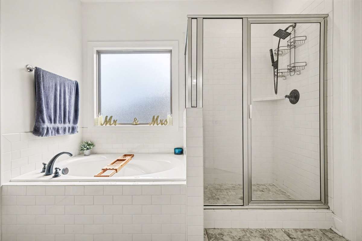 Separate tub and shower.