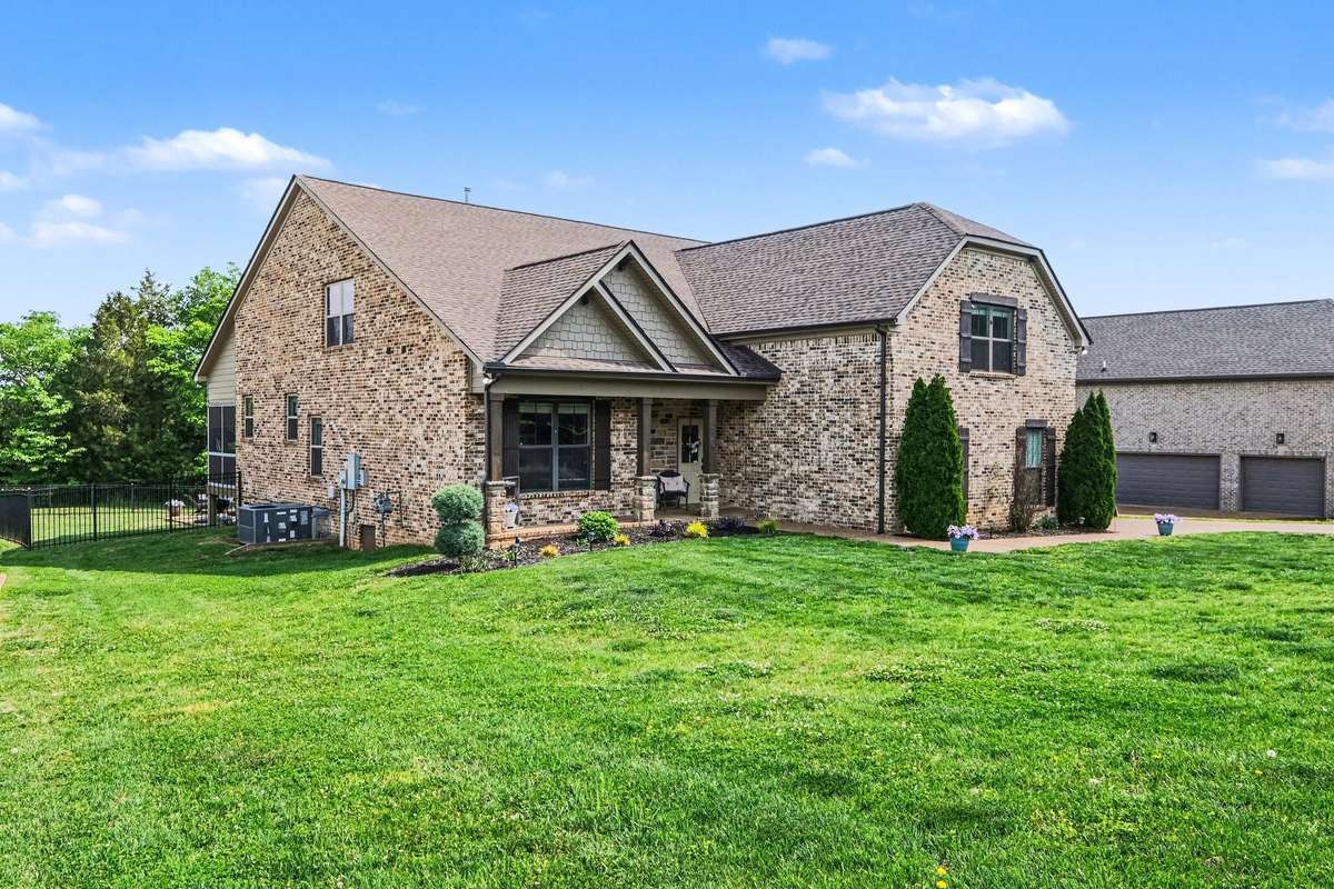All Brick home with shiplap accents.