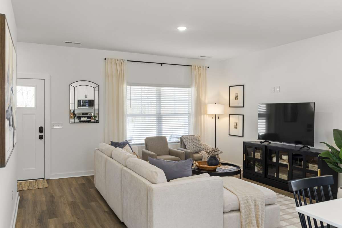 Photos of model home available to tour, staged with furniture for visual reference!