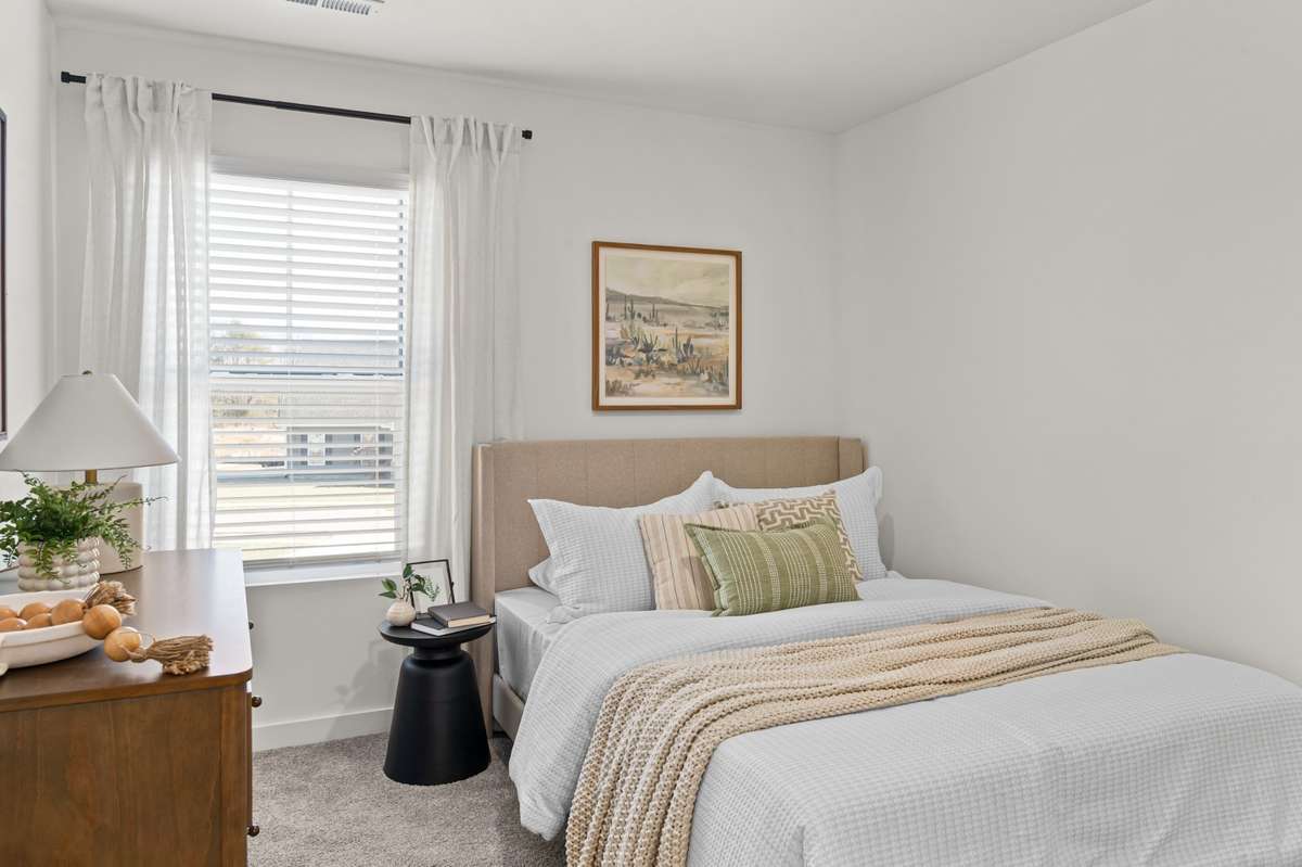 Photos of model home available to tour, staged with furniture for visual reference!