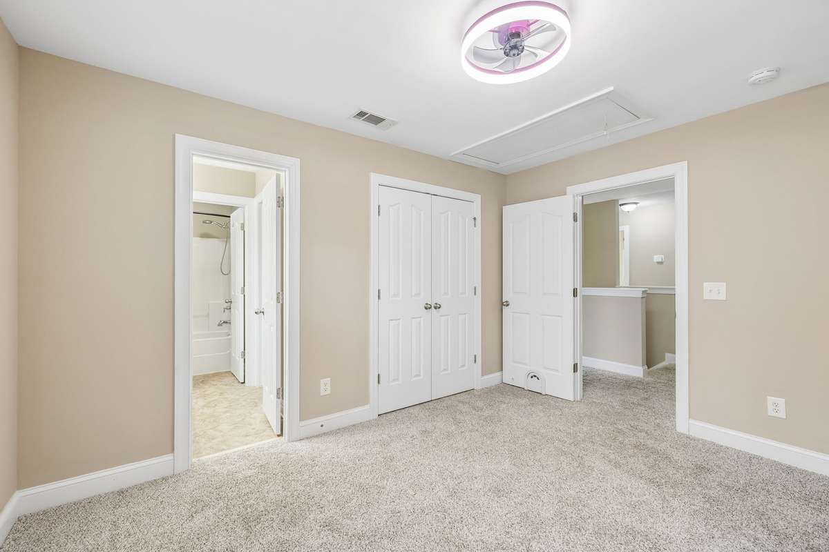 Bedroom with attached bath and double door closet - Attic Access for extra storage!