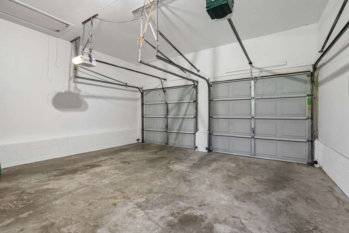 The garage was painted top to bottom, the double garage doors were deep cleaned and new bright new lighting was installed.