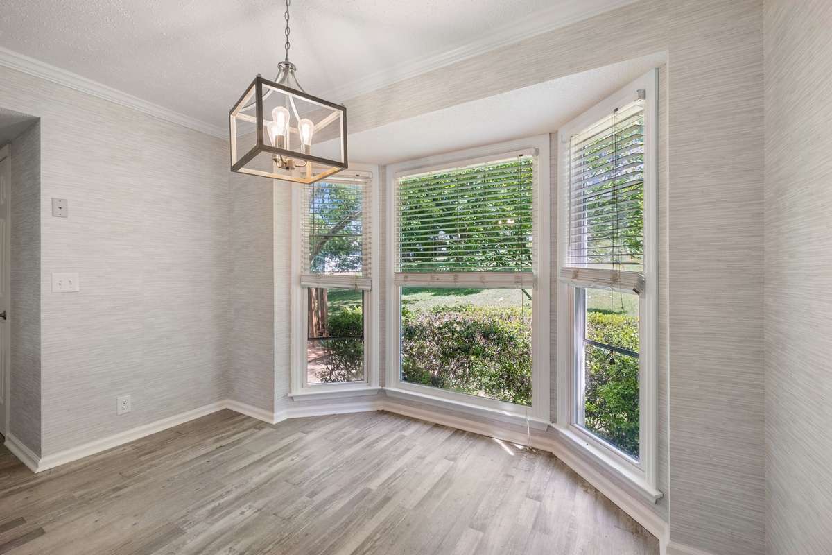 A view of the breakfast nook from the side door that opens to the attached, 2 car garage.