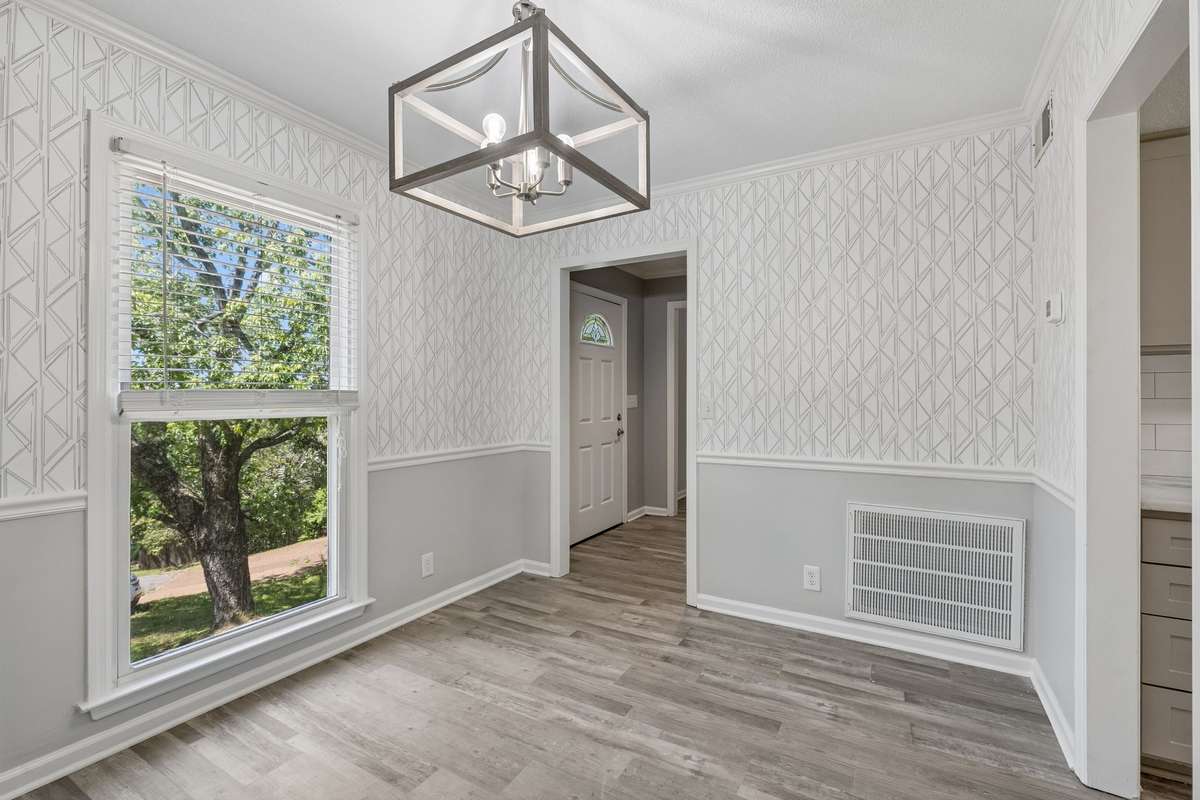 Another view of the dining room looking out into the front yard.
