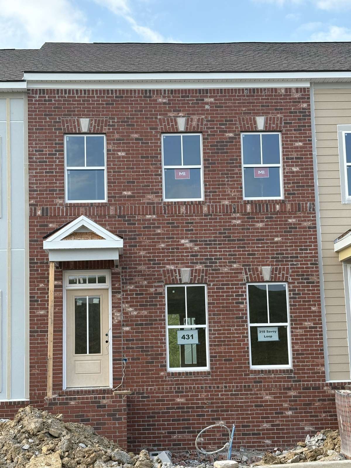 Actual front exterior.  All interior photos are of a previously built Highland and may reflect colors and upgrades not available in this home.  Still time to make your interior selections