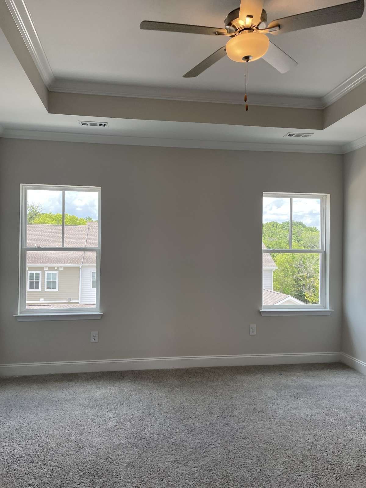 Master bedroom with lots of windows