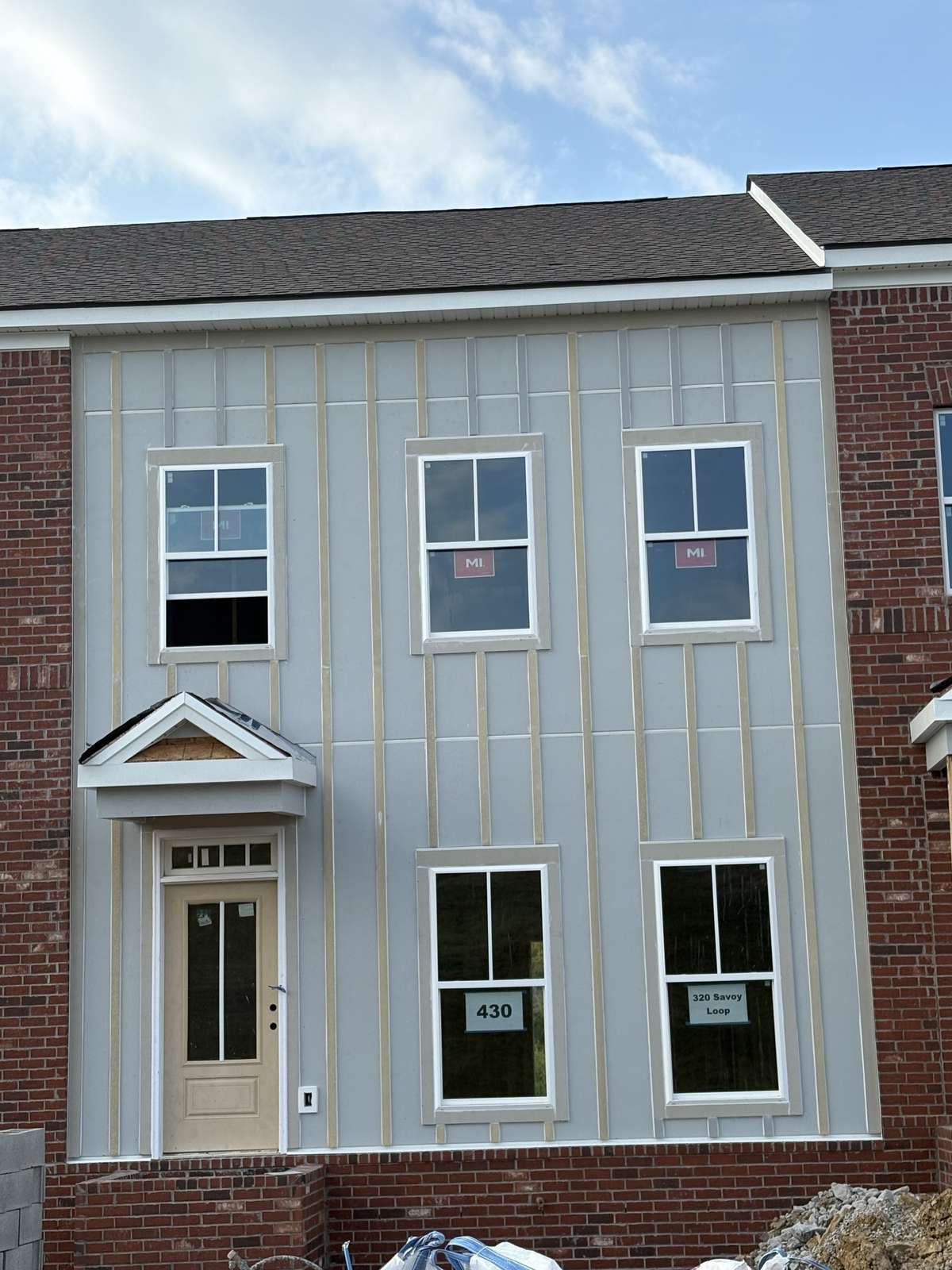 Actual front Exterior.  All interior photos are of another Highland previously built and may show colors and upgrades not available in this home.  Designer color selections under document tab