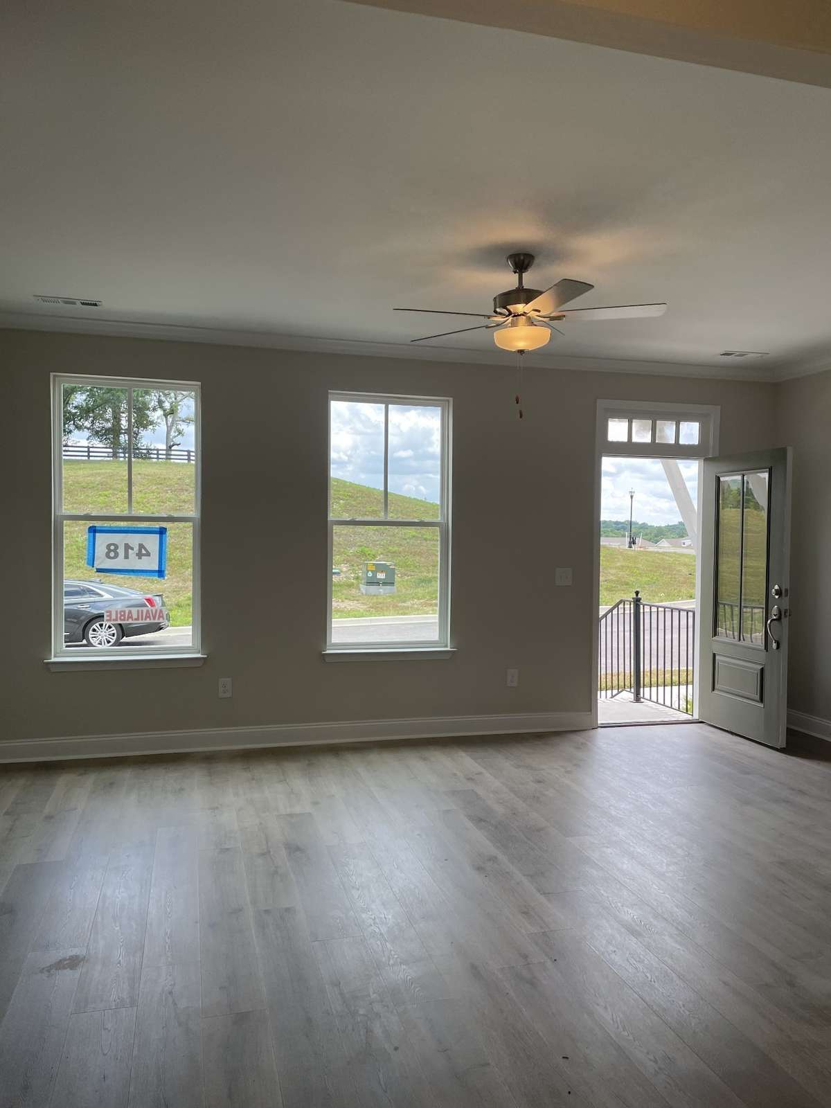 All interior photos are of a previously built Highland and may show colors and options not available in this home.  Welcome Home to your new Highland II 3 bedroom town home.  Spacious Family Room.