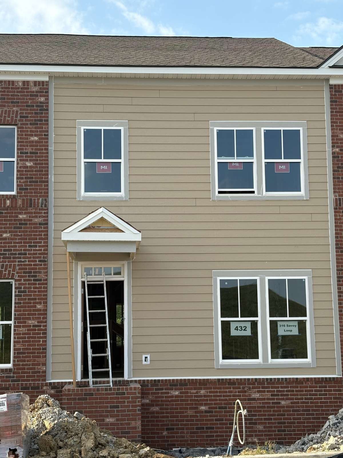 Actual front exterior.  Interior color pictures are of a preiously Highland and may show colors and options not available.  Still time to pick your interior colors.