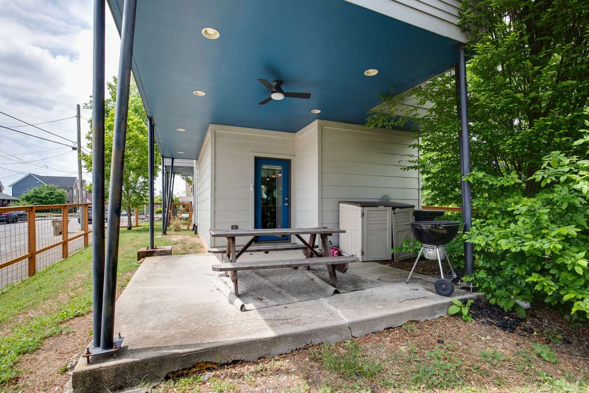 Downstairs patio and fenced in yard.