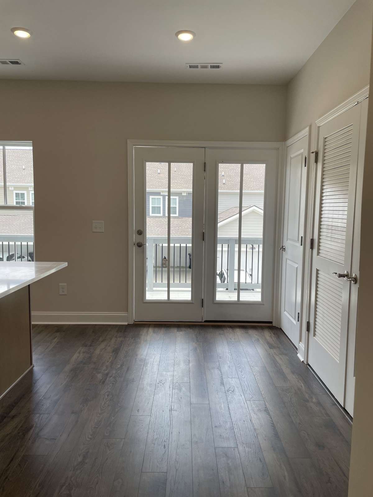 Powder room in Kitchen and Laundry.  Door to back deck.  Great Views from this Unit