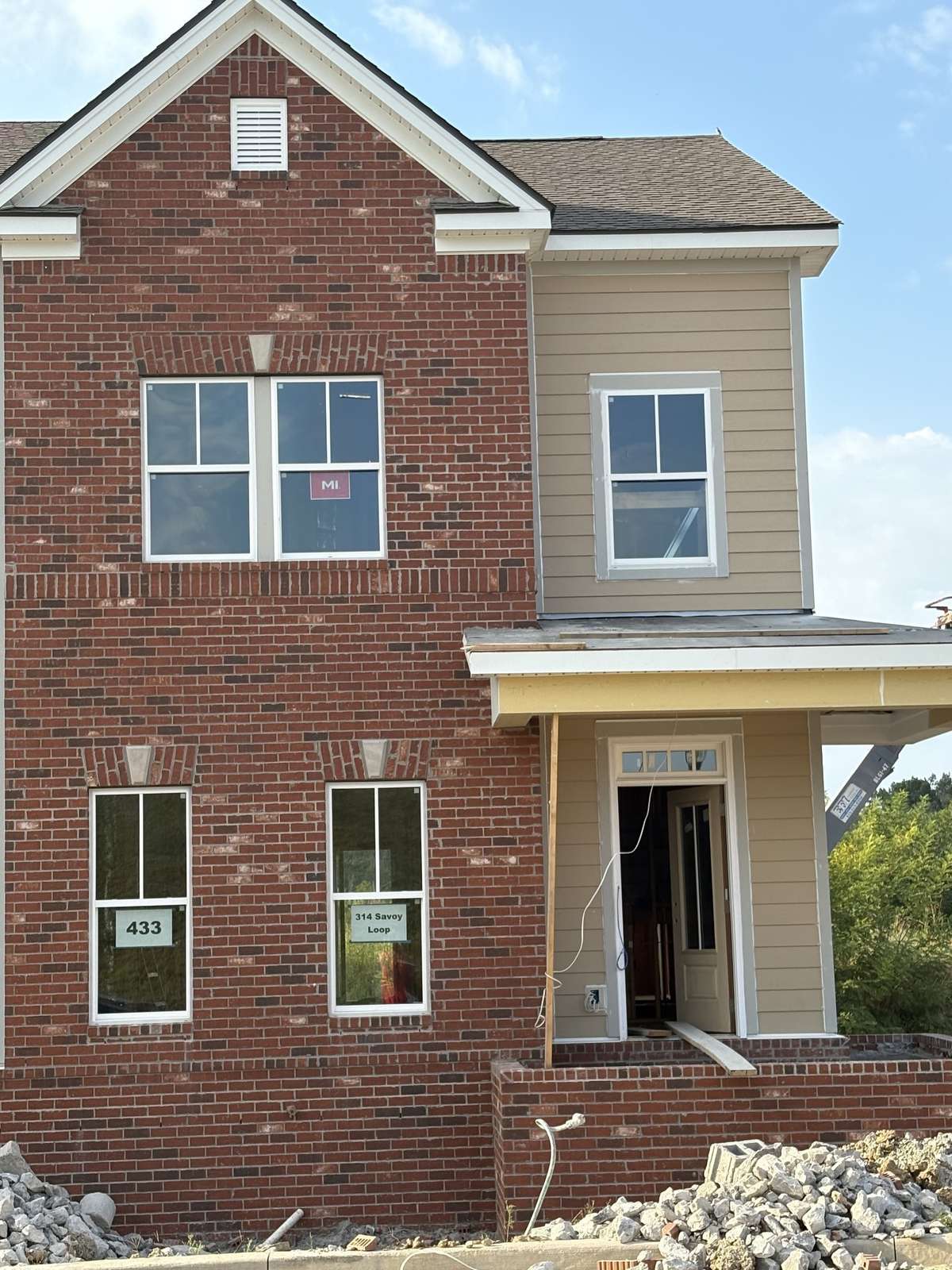 Actual front exterior.  All interior medial are of a previously built Westbrook and may show colors and options not available for this home.  Still time to pick your interior colors
