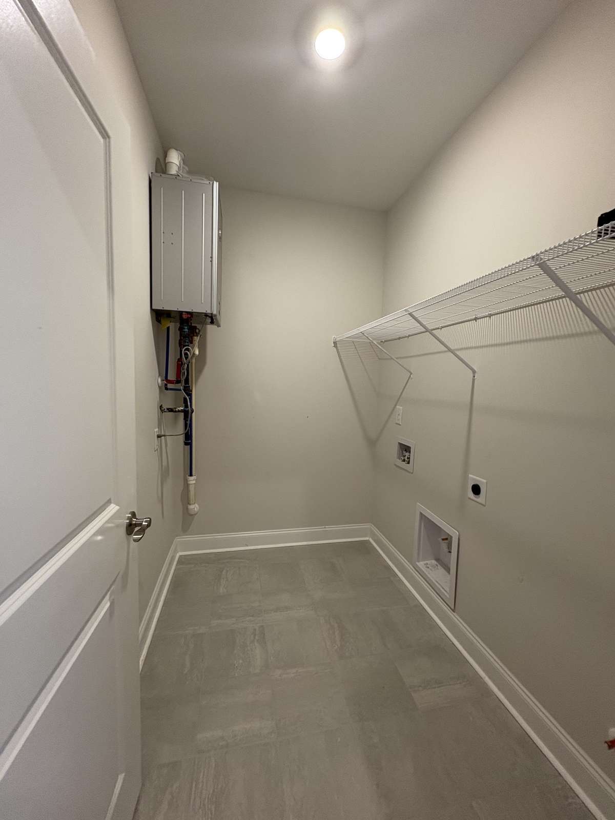 Laundry with gas powered tankless water heater