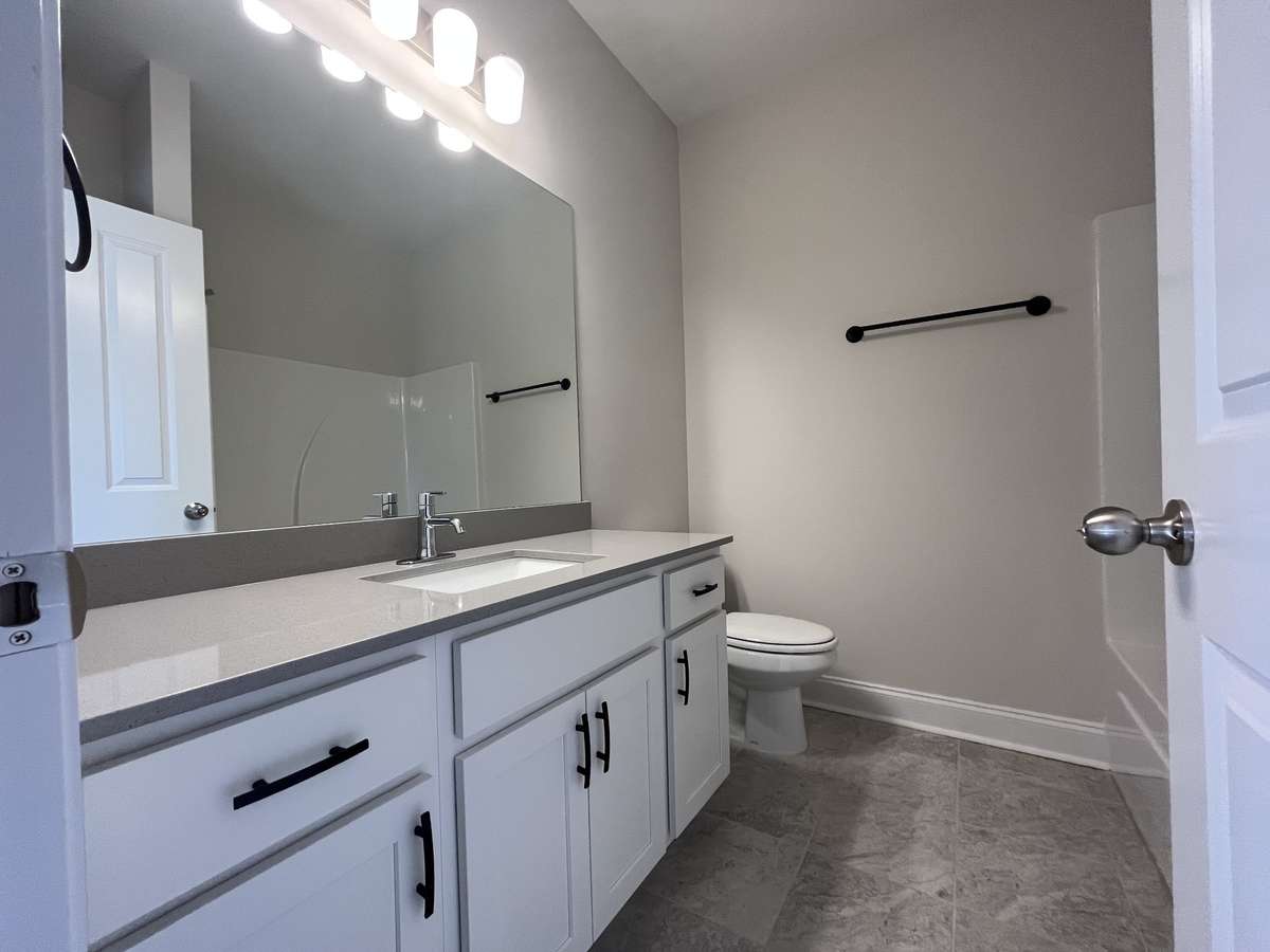 Hall Bath includes tile floor