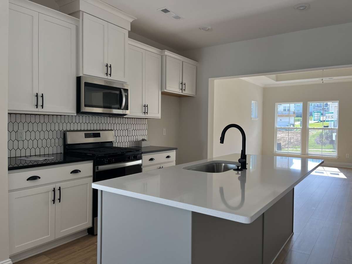 Kitchen with view toward family room