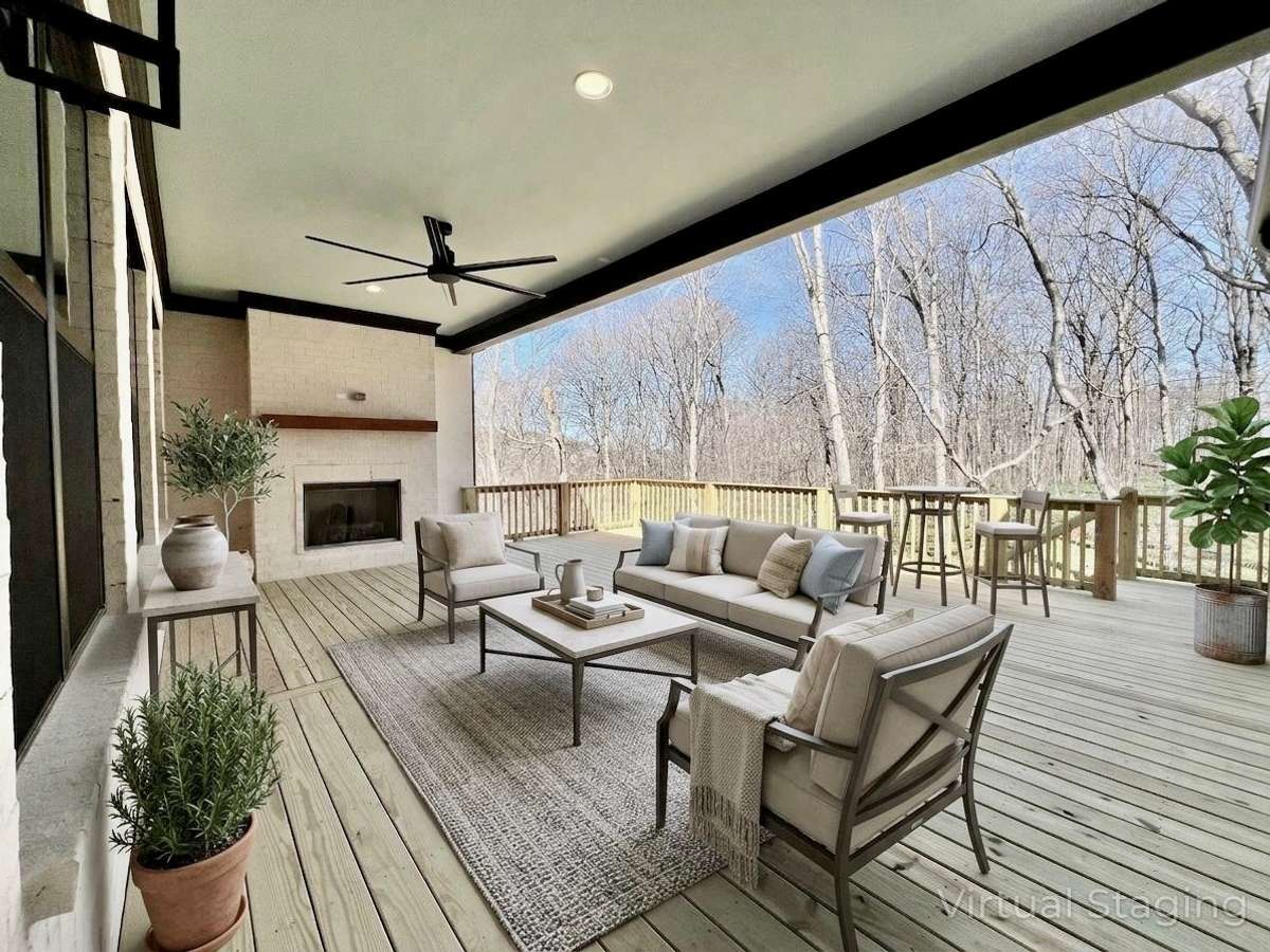 Back Covered Porch w/ Fireplace and Entertaining Terrace • Sodded & Irrigated Yard • All Photos of Similar Homes & For Representation Only. Virtually Staged Photo for Inspiration Only. All Photos of Similar Homes — Actual Home is at Drywall Stage.